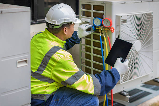 Professional Ac Installation technician working in Lake Mills, IA